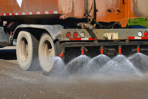 Water Spray from a Dust Suppression Truck Water Spray from a Dust Suppression Truck