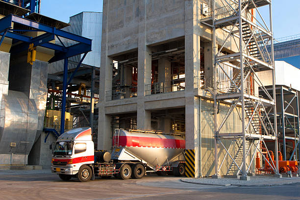 Heavy truck loading the concrete powder to the packing factory Heavy truck loading the concrete powder to the packing factory